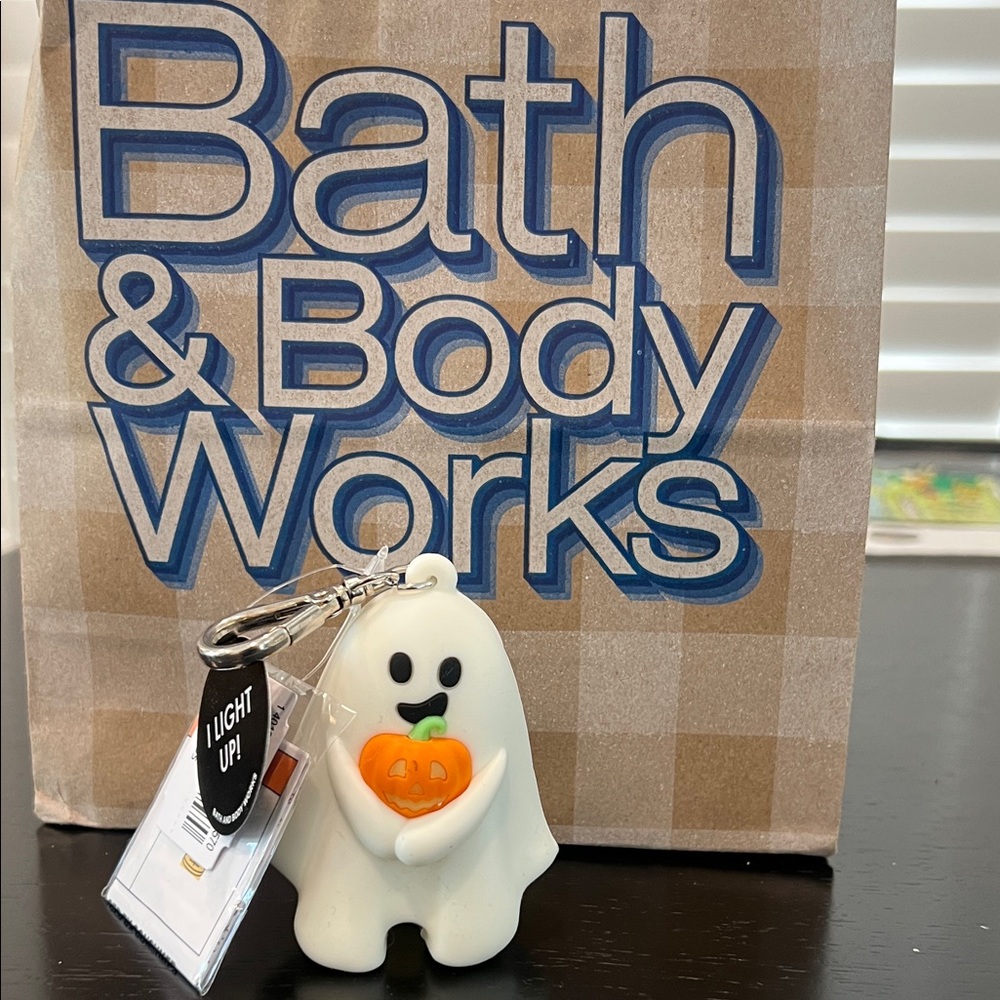 Bath & Body Works White Ghost Keychain with Orange Pumpkin lights up/glow-in-dar